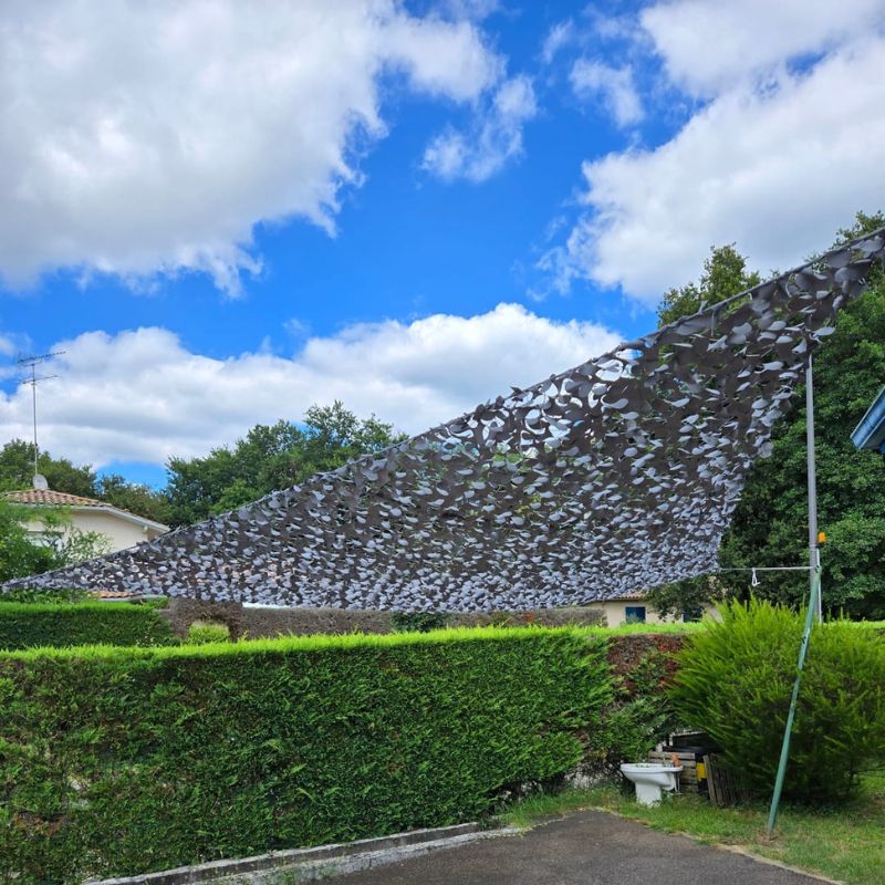 triangular grey camouflage net