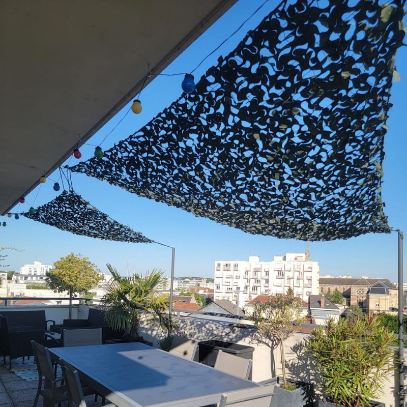 Green triangular camouflage net